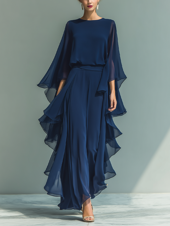 Navy blue chiffon set with delicate ruffles.