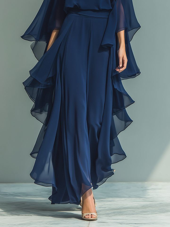 Navy blue chiffon set with delicate ruffles.