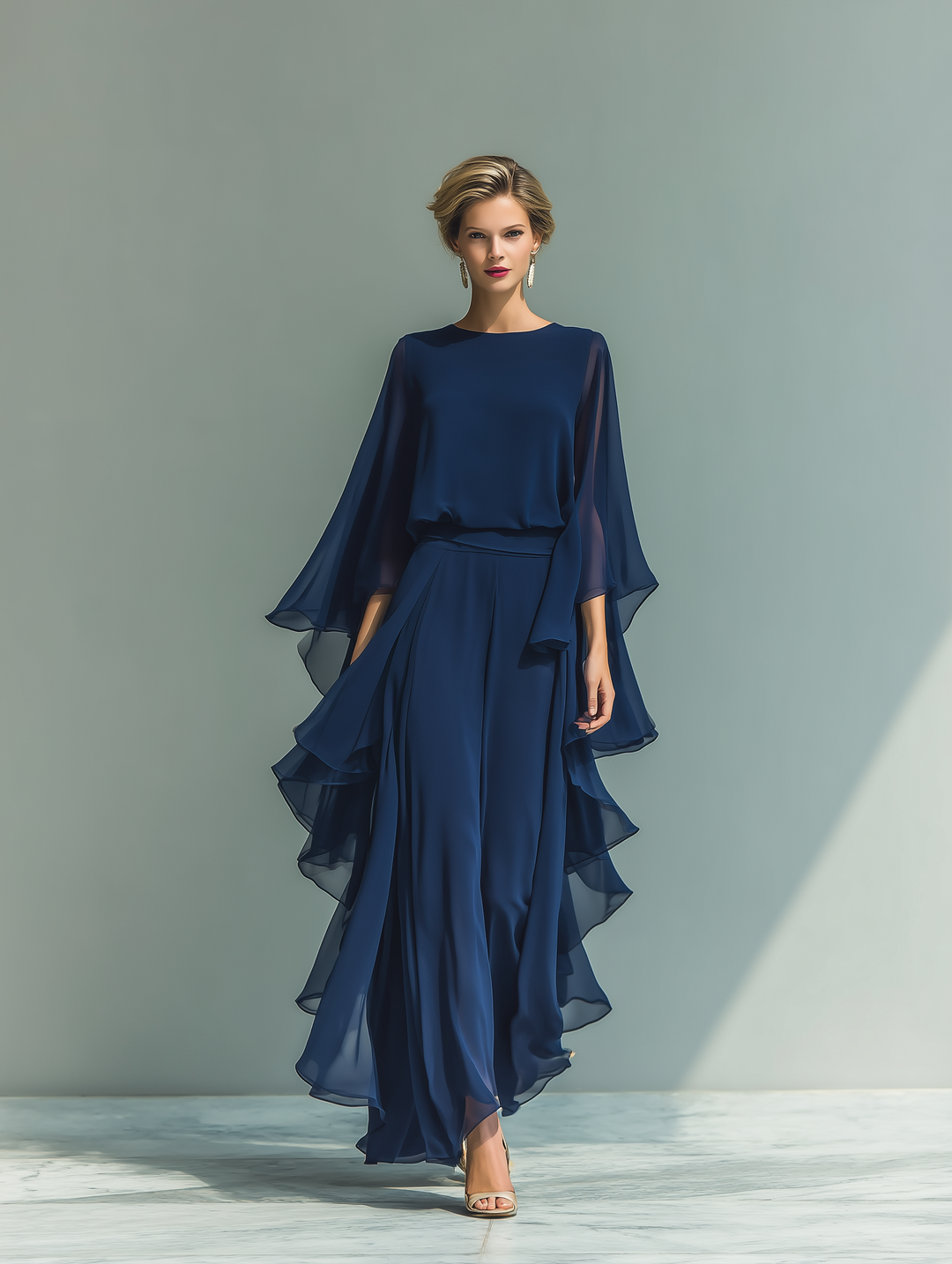 Navy blue chiffon set with delicate ruffles.